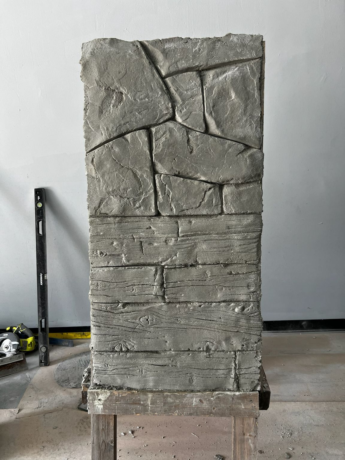 Stone and wood grain, carved in concrete