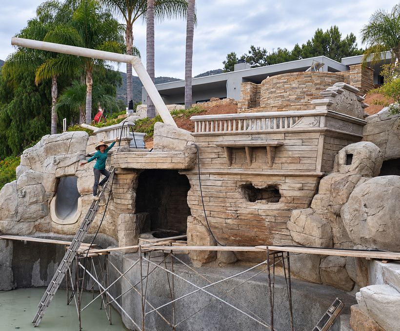 On the ladder during construction, before the pool was filled